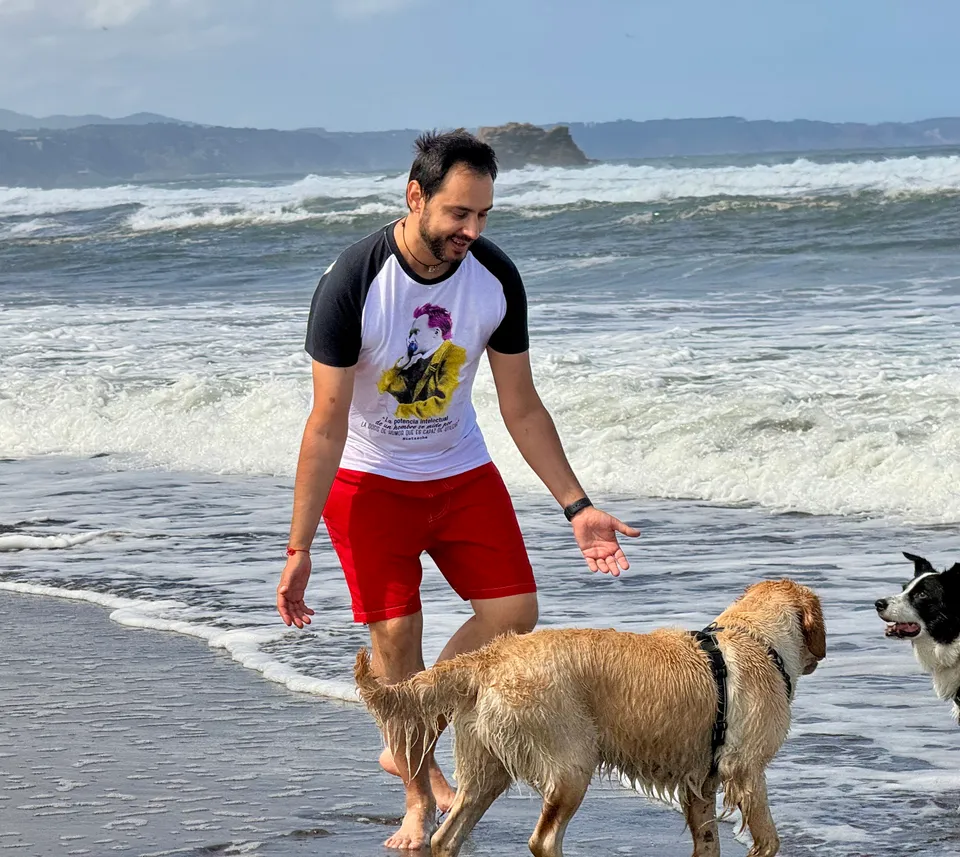 Luka with Kala and another dog at the water’s edge.